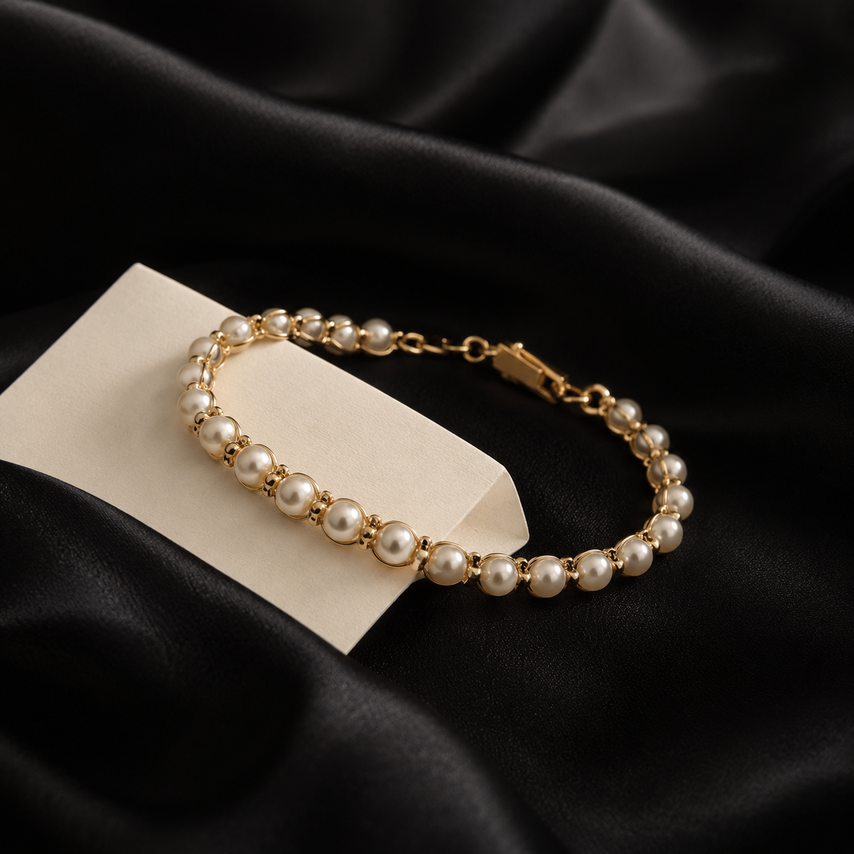 Élan Pearl Tennis Bracelet detail on black silk